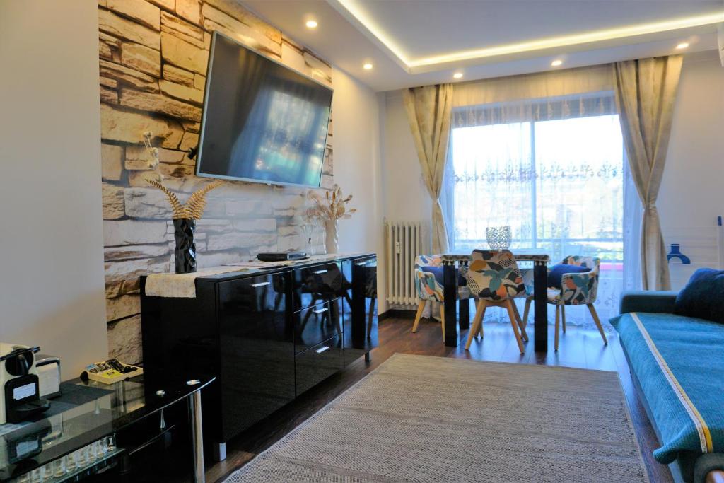 Spacious living room in Antibes apartment with air conditioning 1